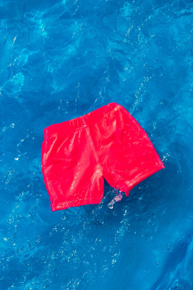 Nestling: Swim Shorts - Neon Pink (1-2 years)